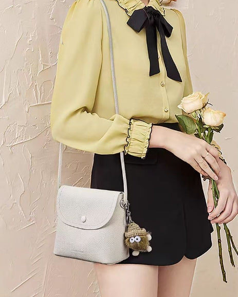 Fashionable bag with cowhide